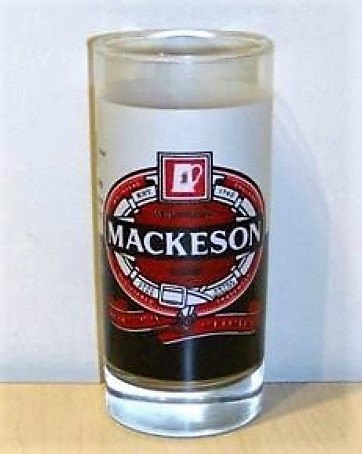 beer glass from the Whitbread  brewery in England with the inscription 'Est 1742 Whitbread Mackeson Stout Very Fine Extra Quality The Original and Genuine'