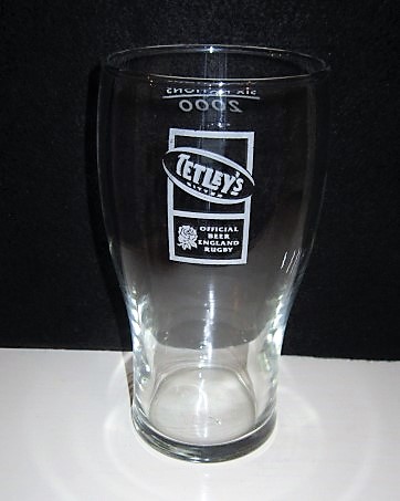 beer glass from the Tetley's brewery in England with the inscription 'Tetley's Bitter OfficialBeer England Rugby'