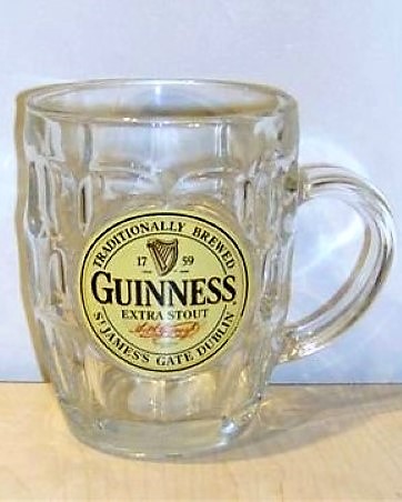 beer glass from the Guinness  brewery in Ireland with the inscription 'Traditionally Brewed 1759 Guinness Extra Stout St James's Gate Dublin'