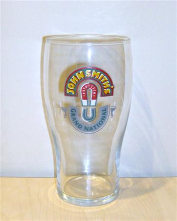 beer glass from the John Smith's brewery in England with the inscription 'John Smiths Grand National'