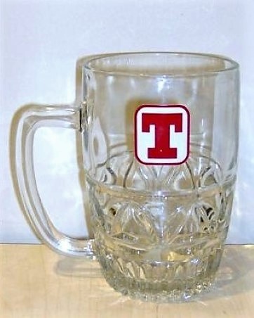 beer glass from the Tennent's brewery in Scotland with the inscription 'T'