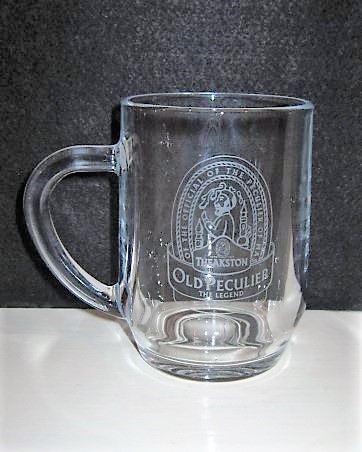 beer glass from the Theakston's  brewery in England with the inscription 'Theakston Old Peculier The Legend Of The Official Of The Peculier Of Mas'