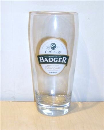 beer glass from the Hall & Woodhouse brewery in England with the inscription 'Established 1777 Badger Brewed With First Gold Single English Hop Alc 4.0% Vol'