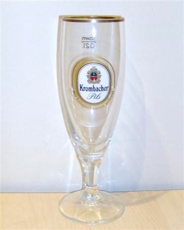 beer glass from the Krombacher brewery in Germany with the inscription 'Krombacher Pils Mit Felsquellwasser Gebraut'