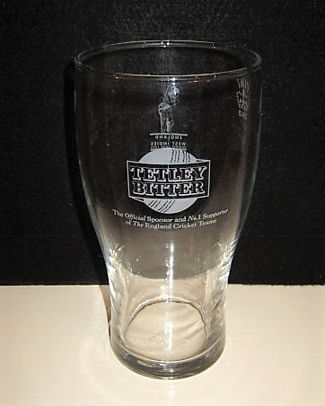 beer glass from the Tetley's brewery in England with the inscription 'Tetley Bitter The Offical Sponsor and No 1 Supporter Of The England Cricket Teams'