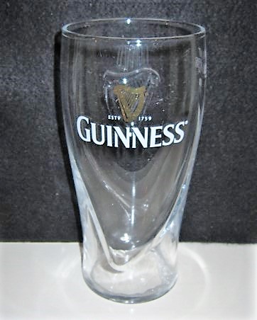 beer glass from the Guinness  brewery in Ireland with the inscription 'Estd 1759 Guinness '