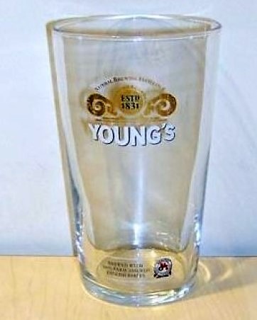 beer glass from the Young's brewery in England with the inscription 'Natural Brewing Excellence ESTD 1831 Young's Brewed With 100% Farm Assured English Barley'