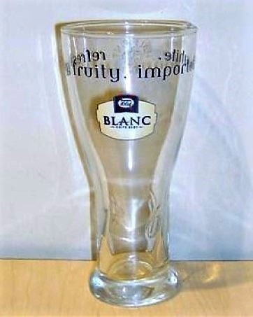 beer glass from the Kronenbourg brewery in France with the inscription 'Refreshing. Fruity. Imported. White. Kronenbourg 1664 Blanc White Beer'