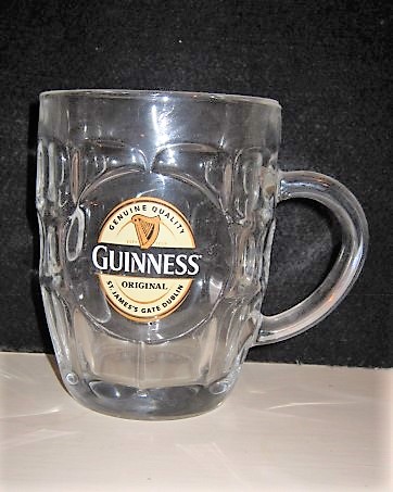 beer glass from the Guinness  brewery in Ireland with the inscription 'Genuine Quality Guinness Original St James's Gate Dublin'