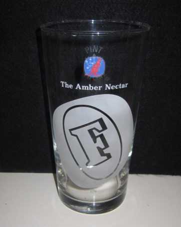 beer glass from the Foster's brewery in Australia with the inscription 'Foster's The Amber Necter'
