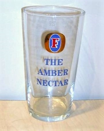 beer glass from the Foster's brewery in Australia with the inscription 'The Amber Necter'