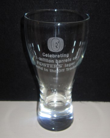 beer glass from the Foster's brewery in Australia with the inscription 'Celebrating 1 - Milion barrels of Foster's Lager Sold in The Off Trade 2003'
