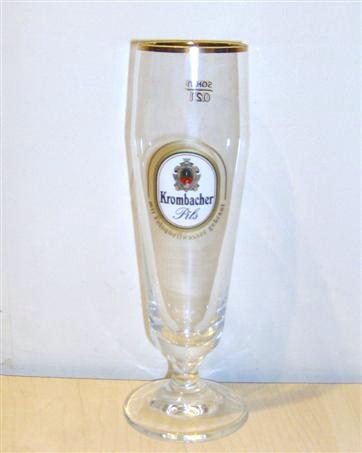 beer glass from the Krombacher brewery in Germany with the inscription 'Krombacher Pils Mit Felsquellwasser Gebraut'