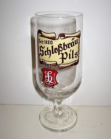 beer glass from the Hartmannsdorf brewery in Germany with the inscription 'Seit 1880 Schlosbrau Pils'