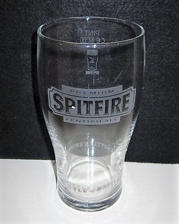 beer glass from the Shepherd Neame brewery in England with the inscription 'Premium Spitfire Kentish Ale T he Bottle Of Britain'