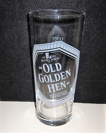 beer glass from the Morland  brewery in England with the inscription 'Est 1711 Morland Old Golden Hen Refreshing Crafted Beer'
