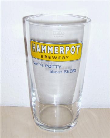 beer glass from the Hammerpot  brewery in England with the inscription 'Hammerpot Brewery We're Potty About Beer'