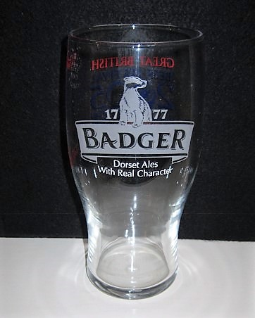 beer glass from the Hall & Woodhouse brewery in England with the inscription '1777 Badger Dorset Ales With Real Character'