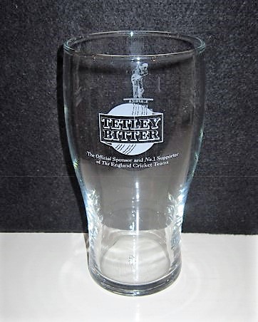 beer glass from the Tetley's brewery in England with the inscription 'Tetley Bitter The Offical Sponsor and No 1 Supporter Of The England Cricket Teams'