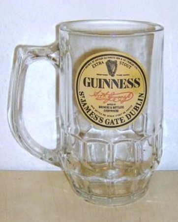 beer glass from the Guinness  brewery in Ireland with the inscription 'Brewed By Arthur Guinness Son & Co (Dublin) LTD Extra Stout Registered Trade Mark Guinness Bottle By Brewers And Bottlers Everywhere  Wo Bottle No Other Stout Or Porter St James's Gate Dublin'