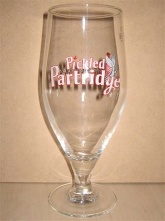 beer glass from the Hall & Woodhouse brewery in England with the inscription 'Pickled Partridge'