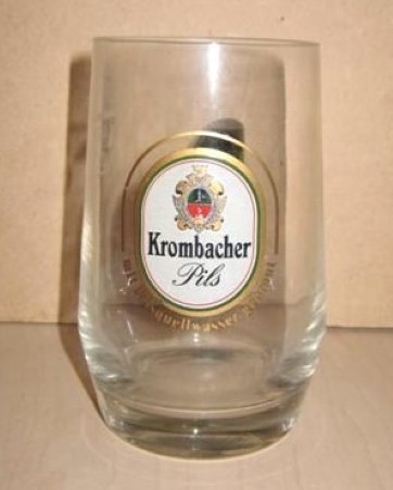 beer glass from the Krombacher brewery in Germany with the inscription 'Krombacher Pils Mit Felsquellwasser Gebraut'