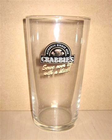 beer glass from the Crabbie's brewery in Scotland with the inscription 'Alcoholic Ginger Beer Crabbie's Serve Over Ice With A Slice.'