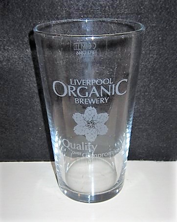 beer glass from the Liverpool Organic brewery in England with the inscription 'Liverpool Organic Brewery Quality Over Compromise'