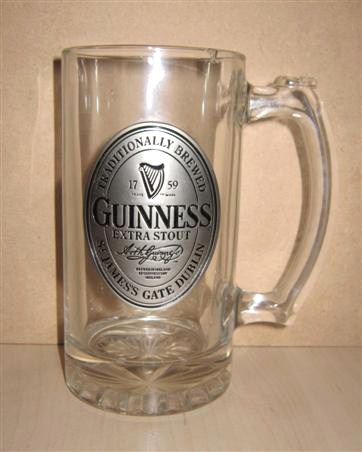 beer glass from the Guinness  brewery in Ireland with the inscription 'Traditionally Brewed 1759 Guinness Extra Stout St James's Gate Dublin'