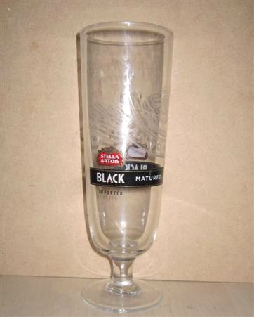 beer glass from the Stella Artois brewery in Belgium with the inscription 'Anno 1366 Stella Artois Black Matured For Longer. Imported'