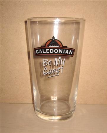 beer glass from the Caledonian  brewery in Scotland with the inscription 'Caledonian Be My Guest'