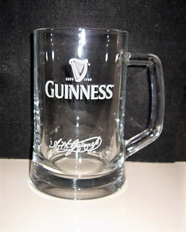 beer glass from the Guinness  brewery in Ireland with the inscription 'Est 1759 Guinness
'