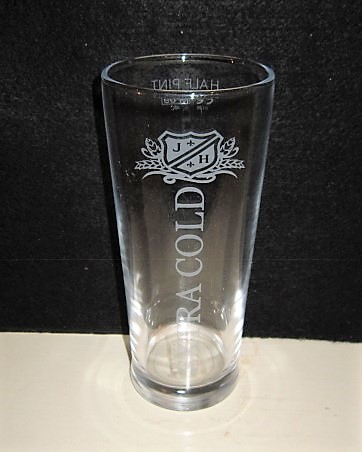 beer glass from the Joseph Holt brewery in England with the inscription 'JH Extra Cold'