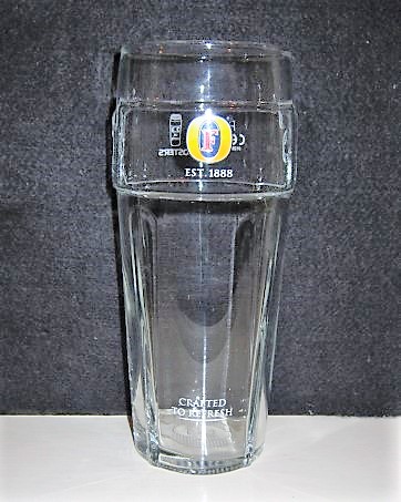 beer glass from the Foster's brewery in Australia with the inscription 'F Est 1888 Crafted To Refresh'