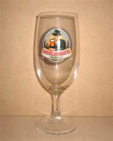 beer glass from the Moretti brewery in Italy with the inscription 'Qualita E Tradizione Birra Moretti Dal 1859'
