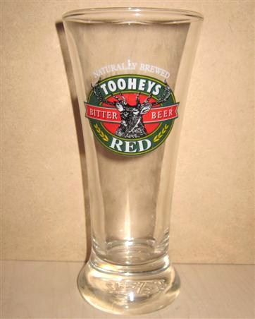 beer glass from the Tooheys  brewery in Australia with the inscription 'Naturally Brewed Tooheys Bitter Beer Red'