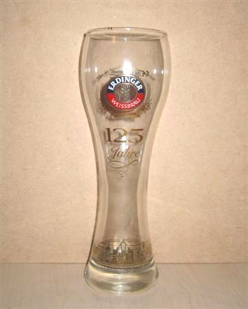 beer glass from the Erdinger  brewery in Germany with the inscription 'Erdinger Weissbru Aus Bayern. 125 Jahre. Privatbrauerei Seit 1886.'