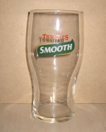 beer glass from the Thwaites brewery in England with the inscription 'Thwaites Smooth'