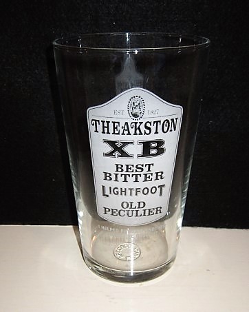 beer glass from the Theakston's  brewery in England with the inscription 'Theakston XB Best Bitter Lightfoot Old Peculier. I Helped Prevent Another Yorkshire Drought'