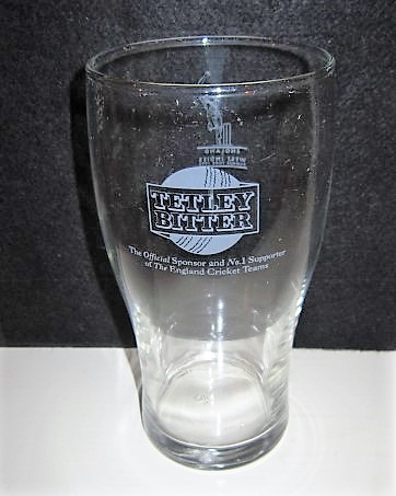 beer glass from the Tetley's brewery in England with the inscription 'Tetley Bitter. The Offical Sponsor and No 1 Supporter Of The England Cricket Teams'