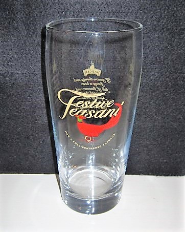beer glass from the Hall & Woodhouse brewery in England with the inscription 'Festive Feasant'