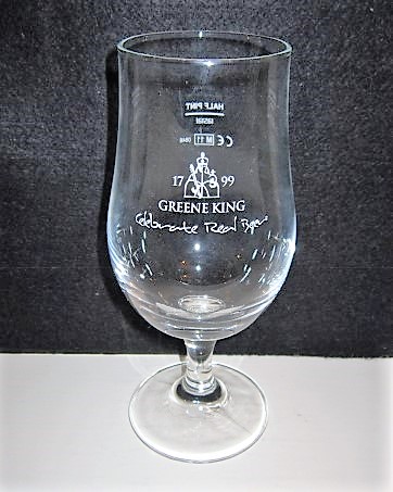 beer glass from the Greene King brewery in England with the inscription '1799 Green King Celebrate Real Beer'