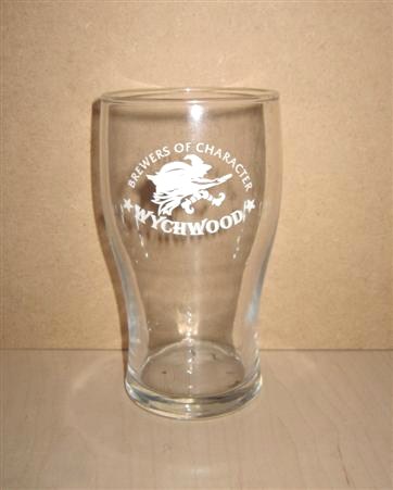 beer glass from the Wychwood  brewery in England with the inscription 'Brewers Of Character. Wychwood'