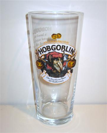 beer glass from the Wychwood  brewery in England with the inscription 'Wychwood Brewery. Hobgoblin The Unofficial Beer Of Halloween'