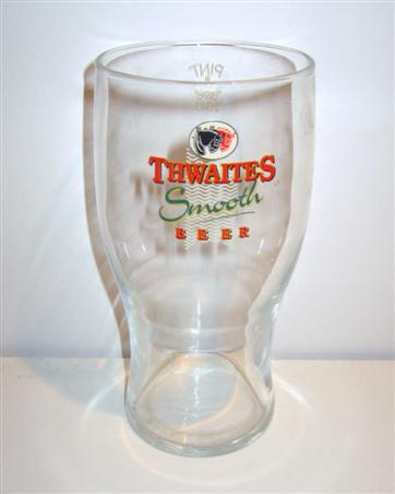 beer glass from the Thwaites brewery in England with the inscription 'Thwaites Smooth Beer'