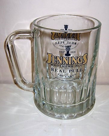beer glass from the Jennings brewery in England with the inscription 'Jennings Brother PLC. The Real Pull Of The Lakes. The Castle Brewery Cockermouth Cumbria'
