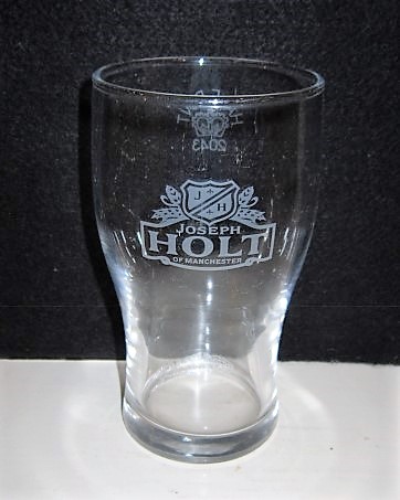 beer glass from the Joseph Holt brewery in England with the inscription 'J H Joseph Holt Of Manchester'