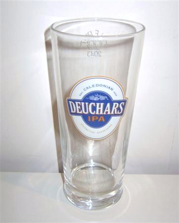 beer glass from the Caledonian  brewery in Scotland with the inscription 'Est Caledonian 1869. Distinctive Refreshing'