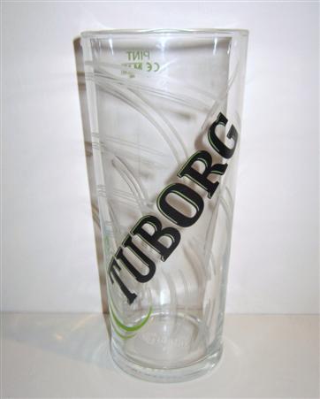 beer glass from the Tuborg brewery in Denmark with the inscription 'Tuborg Genuine Quality Green. Enjoyed Since 1880 Copenhagen Denmark'