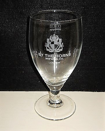 beer glass from the By The Horns brewery in England with the inscription 'By The Horns Brewing Co London'